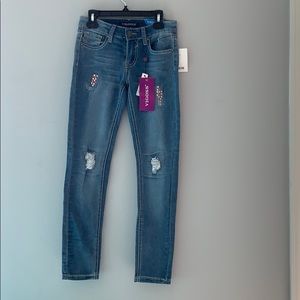 Girls ripped skinny jeans with gems